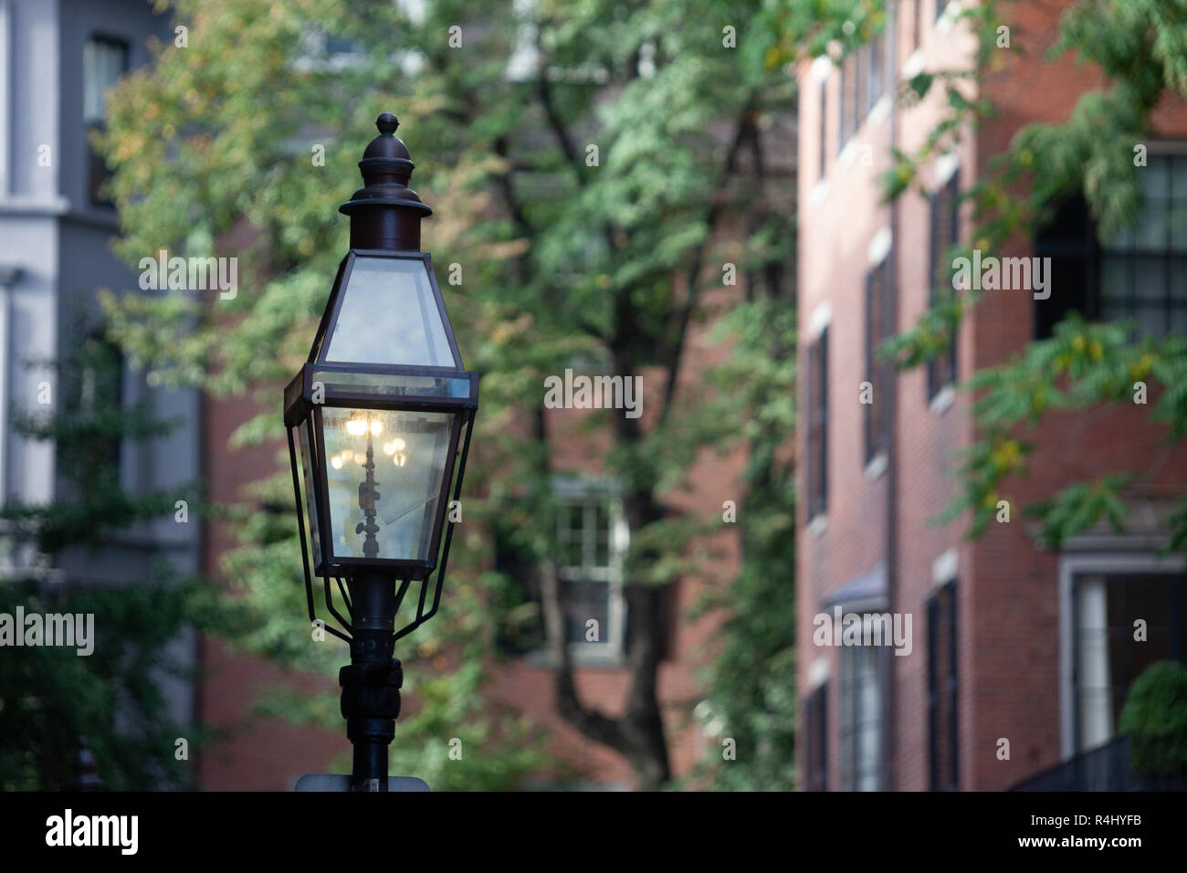 Old style street lamp in front of brownstones on Beacon Street, Back