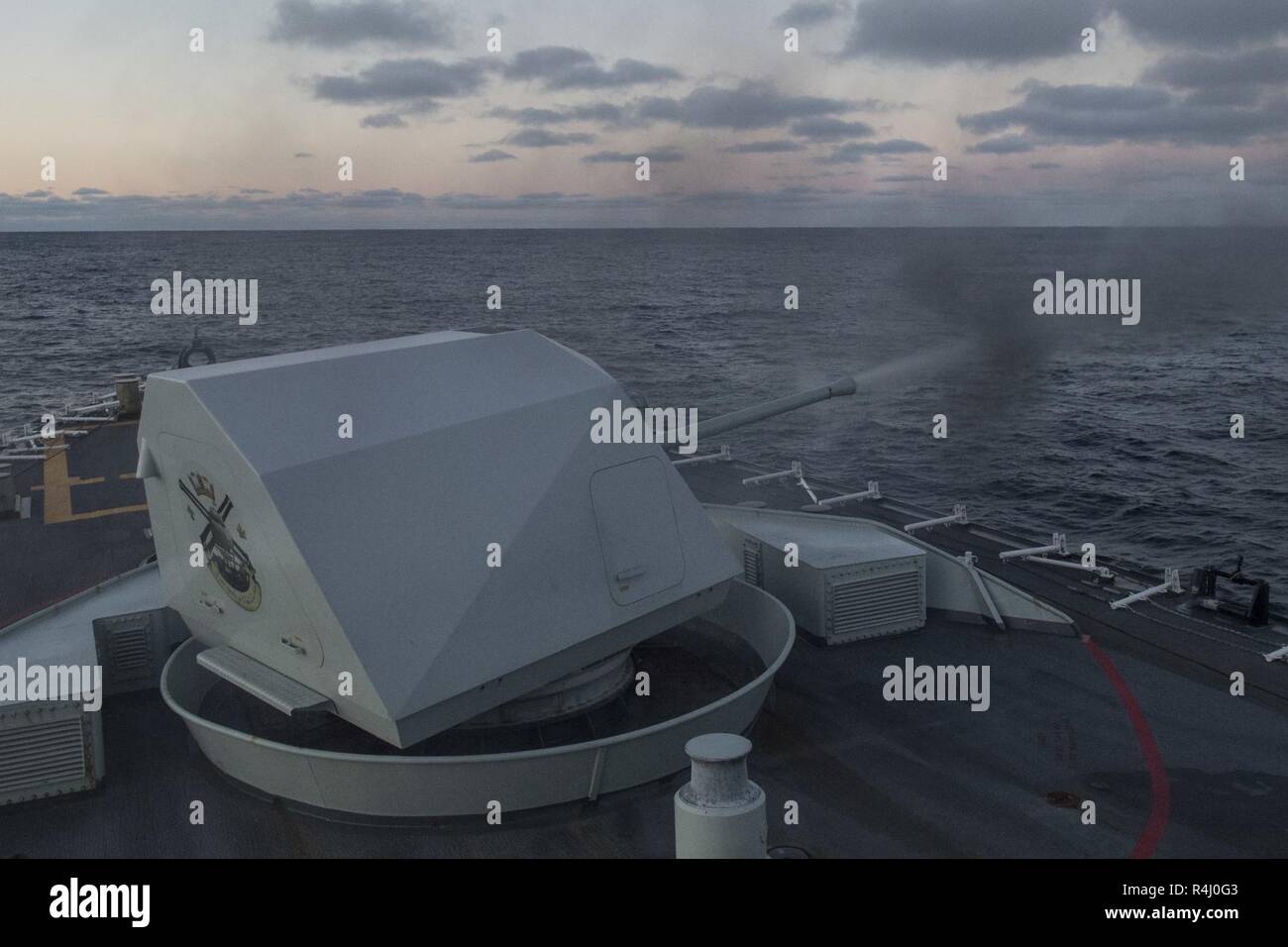 Her Majesty’s Canadian Ship Ville De Québec fires the 57mm main gun