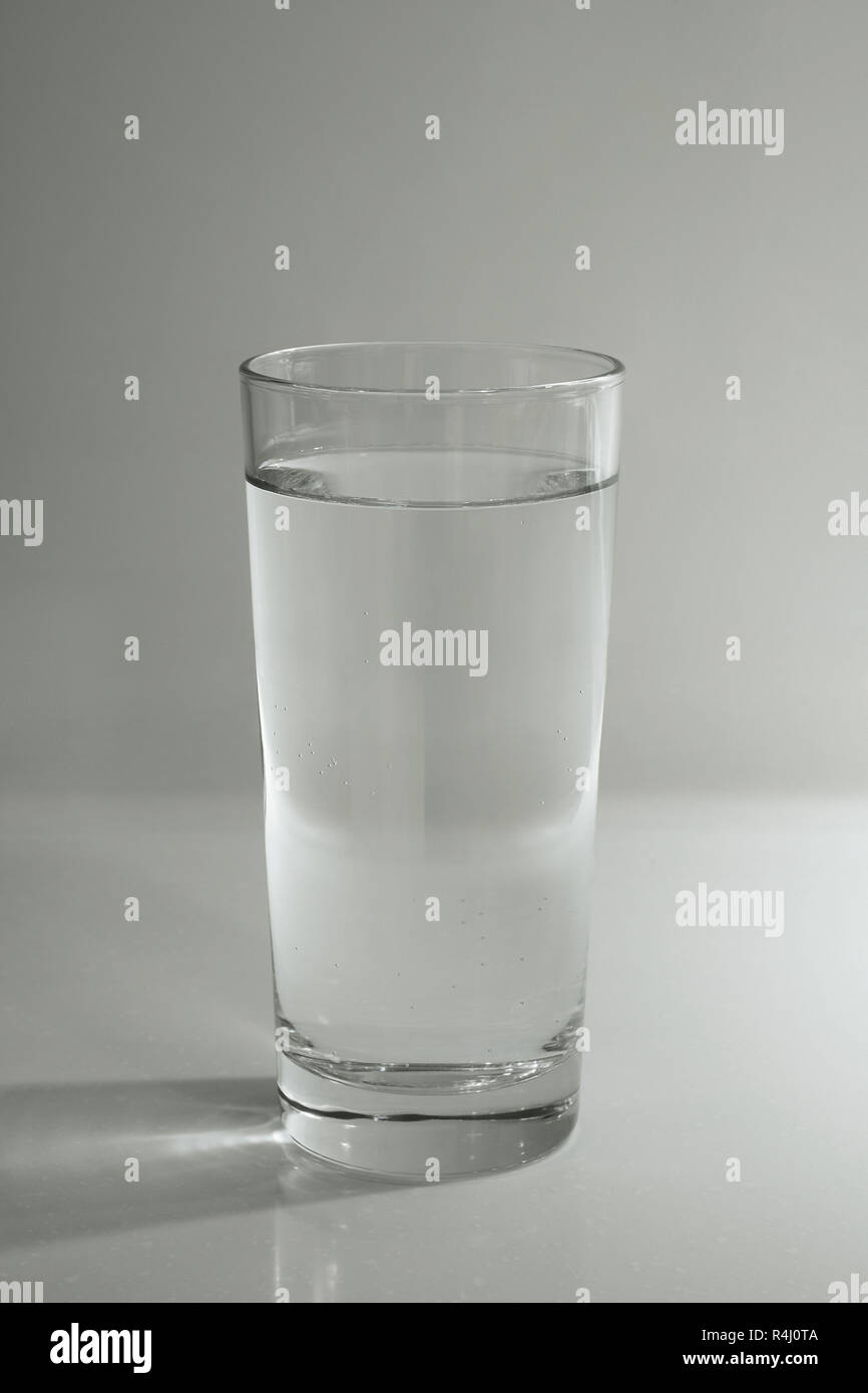 A glass of water against white background Stock Photo