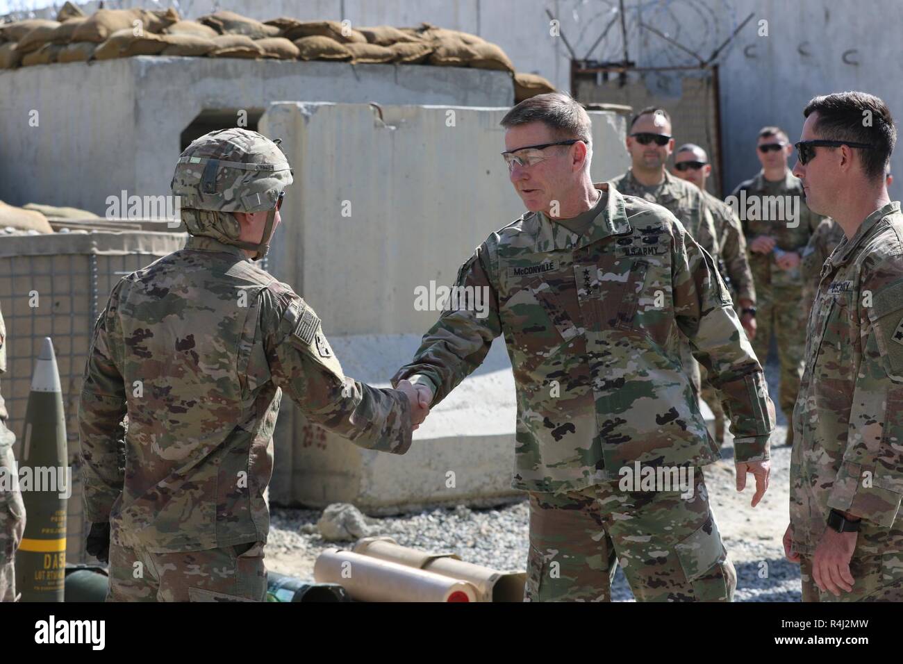 Laghman Province, Afghanistan (October 27, 2018) – Gen. James C. McConville, Vice Chief of Staff of the Army, greets Staff Sgt. Dylan Walsh, a cannon crewmember and Las Vegas, Nevada native from 2nd Battalion, 12th Field Artillery Regiment, 1st Stryker Brigade Combat Team, 4th Infantry Division during his visit to Train, Advise, assist, Command East headquarters. Stock Photo