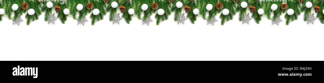 Christmas tree branches on white background as a border Stock Photo