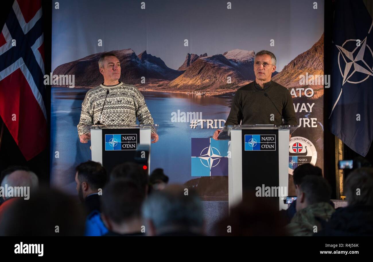 NATO Secretary General, Jens Stoltenberg (right), and Norwegian Defense Minister, Frank Bakke-Jensen (left), address the medias during Exercise TRIDENT JUNCTURE 2018 Distinguished Visitor Day in Trondheim, Norway, on October 30, 2018.    With around 50,000 personnel participating in Trident Juncture 2018, it is one of the largest NATO exercises in recent years. Around 250 aircraft, 65 vessels and more than 10,000 vehicles are involved in the exercise in Norway. Stock Photo