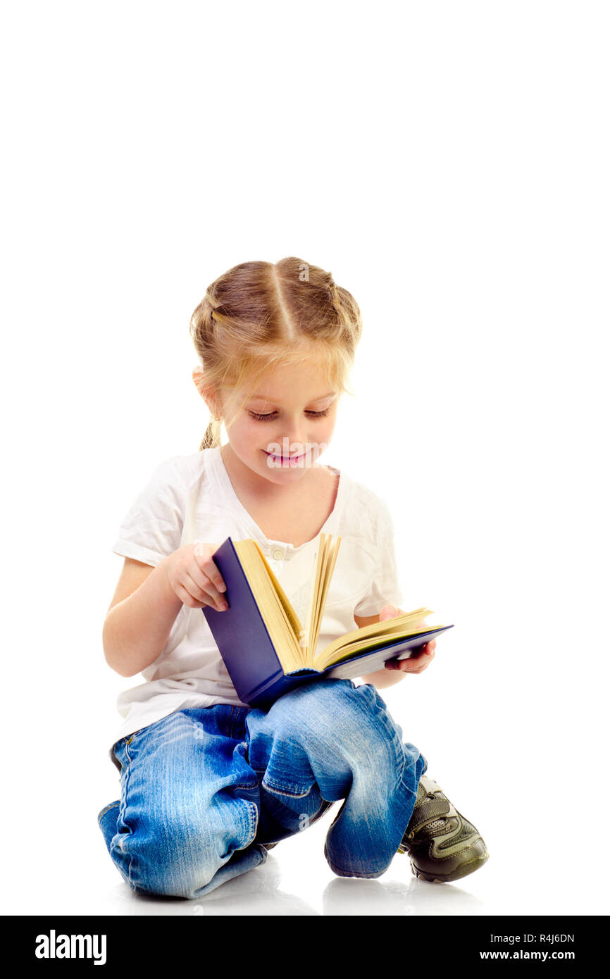 little girl reading book isolated on a white background Stock Photo - Alamy