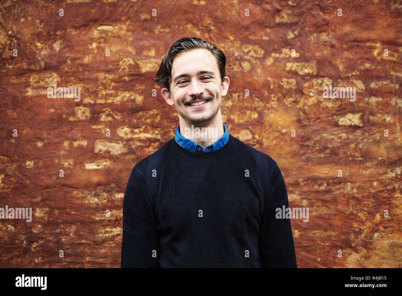 Young man smiling in Copenhagen Stock Photo