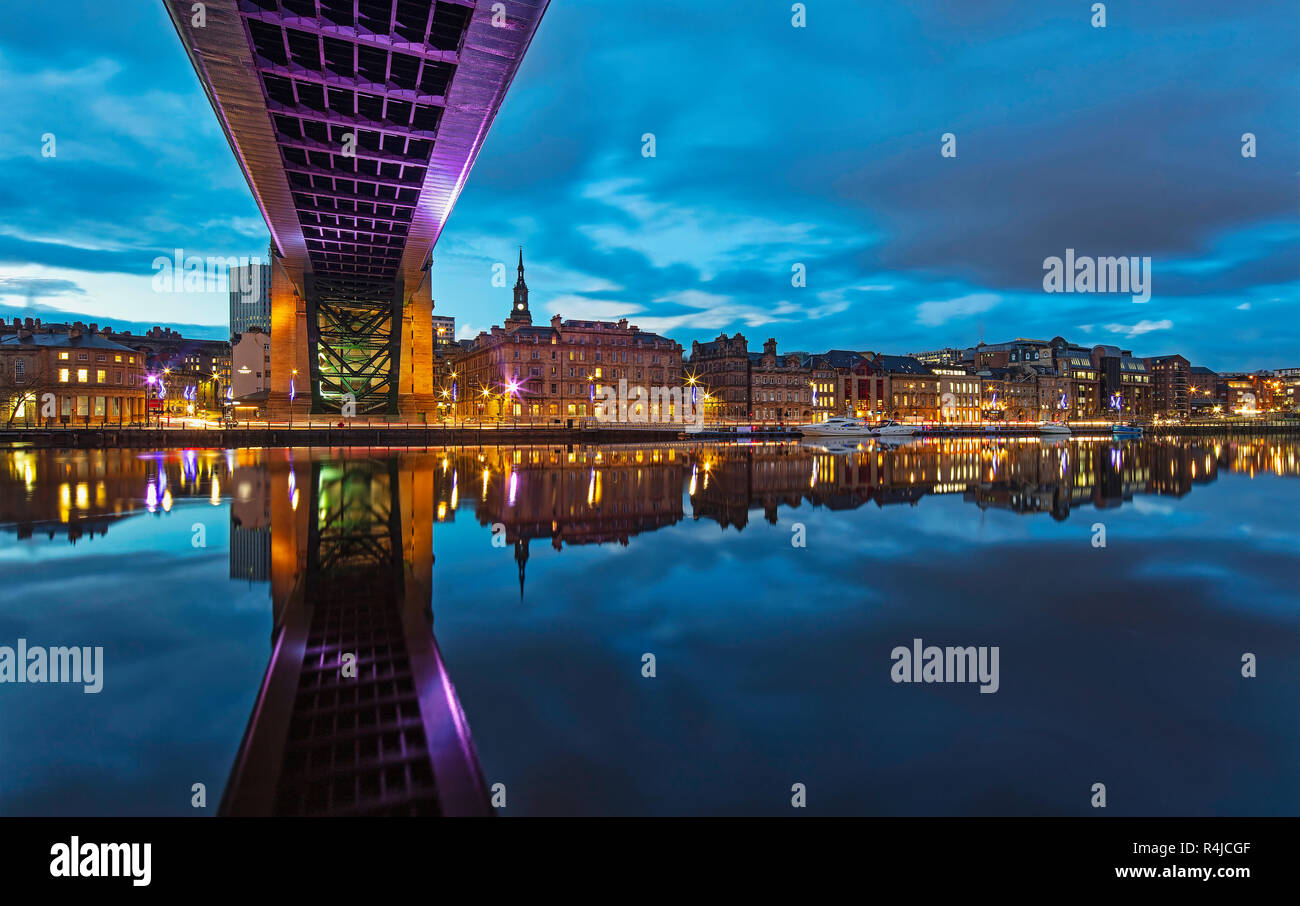 Reflections along Newcastle quayside at twilight, Newcastle upon Tyne, Tyne & Wear, England, United Kingdom Stock Photo