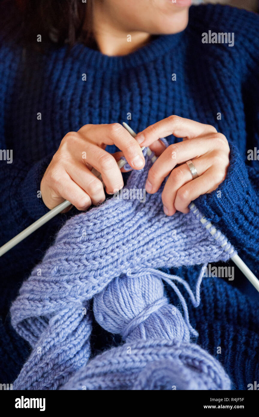 Young woman knitting in Sweden Stock Photo