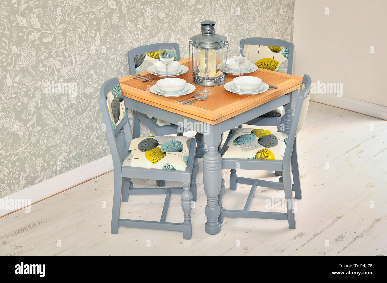 Shabby Chic Dining Table With Chairs And Tableware Stock
