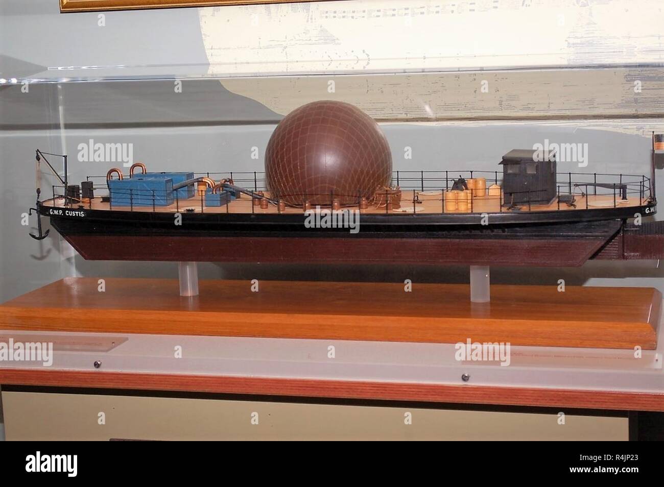 The Hampton Roads Naval Museum contains a detailed model of the USS G.W. Parke Custis. The balloon boat was used by Union forces for the first time on November 11, 1861, when Thaddeus Lowe conducted an aerial observation of Confederate positions from the vessel. This observation paved the way for the US Navy’s present use of air and an element of sea power. The model in the museum’s gallery was built by Floyd Hudson, and was presented to the Truxton-Decatur Museum in 1961. The model was eventually presented to the museum Stock Photo