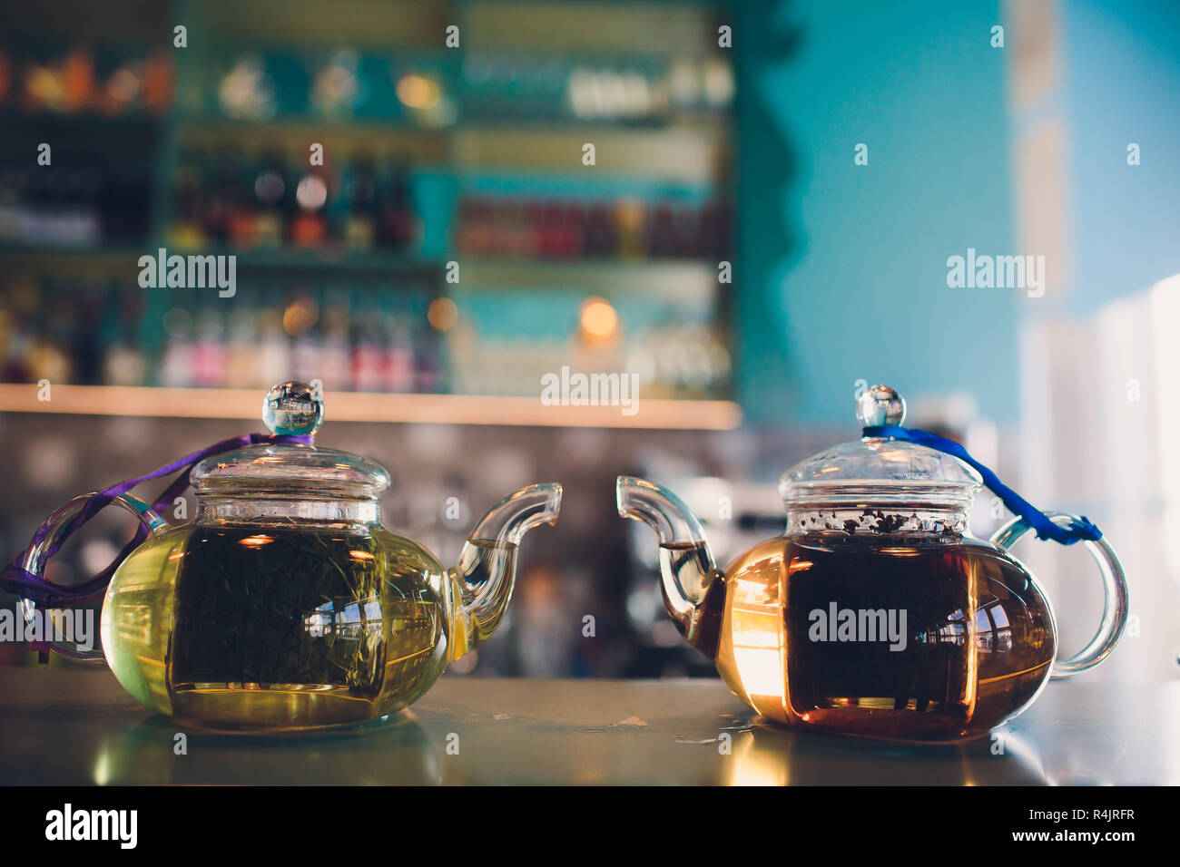 Two glass teapot half full of freshly brewed black tea Stock Photo Alamy