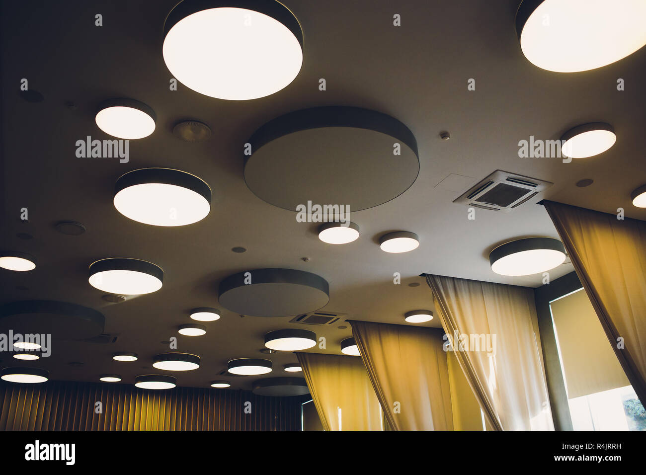 Big Grey Ivory Hexagons With Light Inside Is On Ceiling With