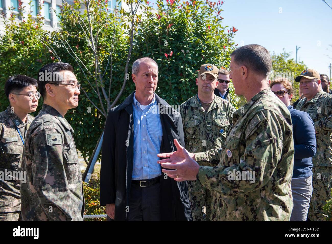 BUSAN, Republic of Korea (Oct. 30, 2018)  U.S. Rep. William McClellan 'Mac' Thornberry, chairman of the House Armed Services Committee (HASC), speaks with Rear Adm. Michael E. Boyle, commander, U.S. Naval Forces Korea (CNFK) and Republic of Korea (ROK) Navy Vice Adm. Jung, Jin-sup, commander, ROK Fleet. Thornberry's visit to CNFK is a part of an overall site visit to the Korean peninsula to meet with U.S. military components and gain a better understanding of the U.S. and ROK alliance. Stock Photo