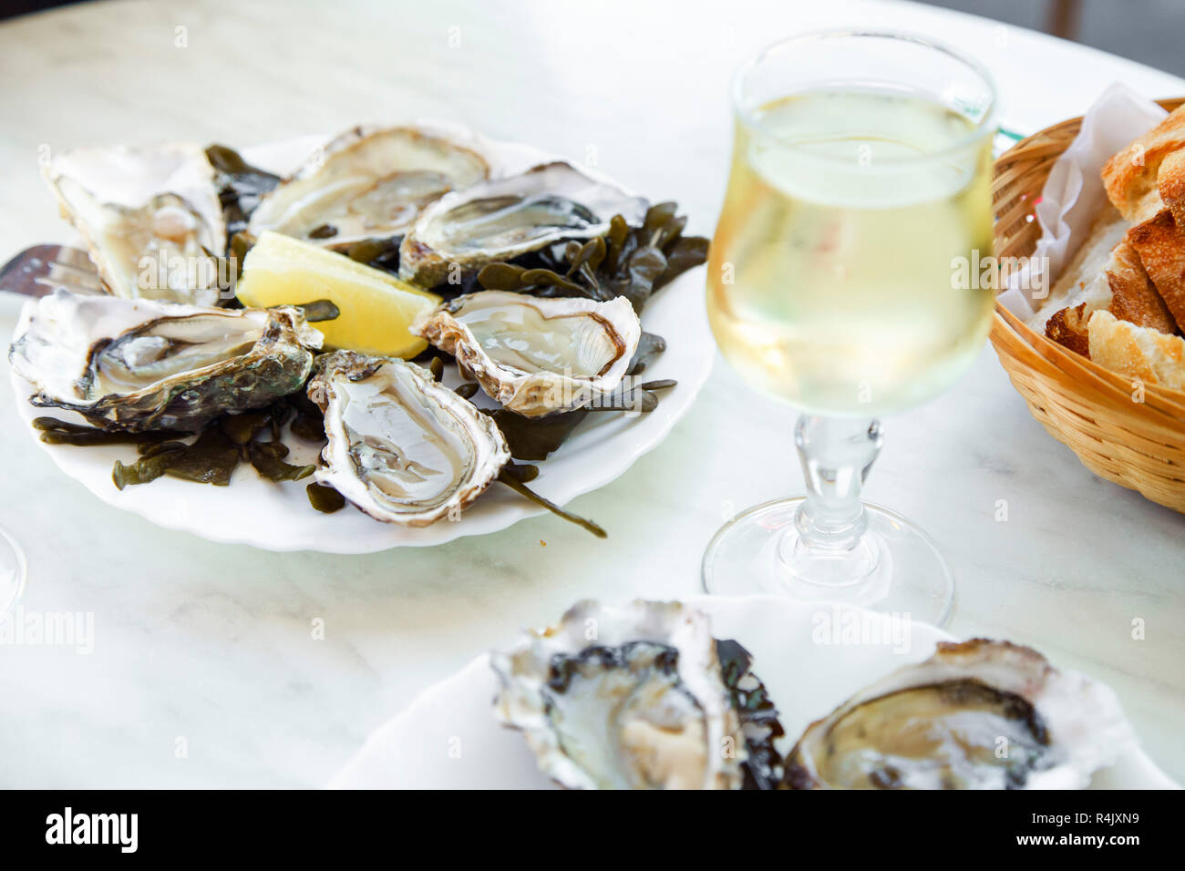 Raw oyster restaurant france hires stock photography and images Alamy