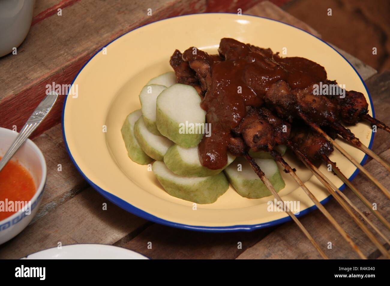 Sate Ayam Madura. The most popular Indonesian chicken satay originated from Madura, East Java. Stock Photo