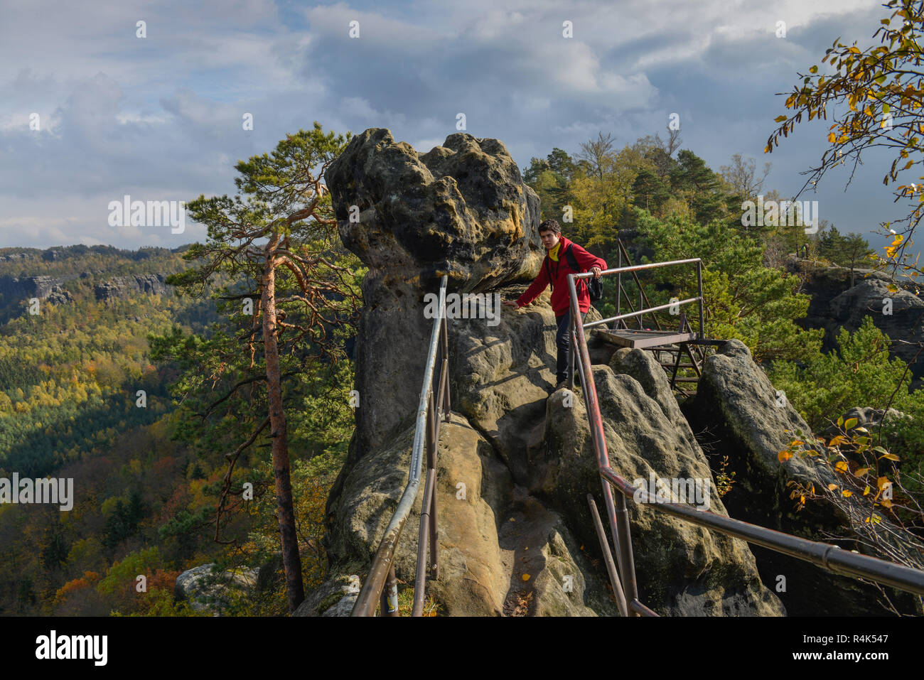 Traveller on the burr way of the Schrammsteine, national park Saxon Switzerland, Saxony, Germany, Wanderer auf dem Gratweg der Schrammsteine, National Stock Photo