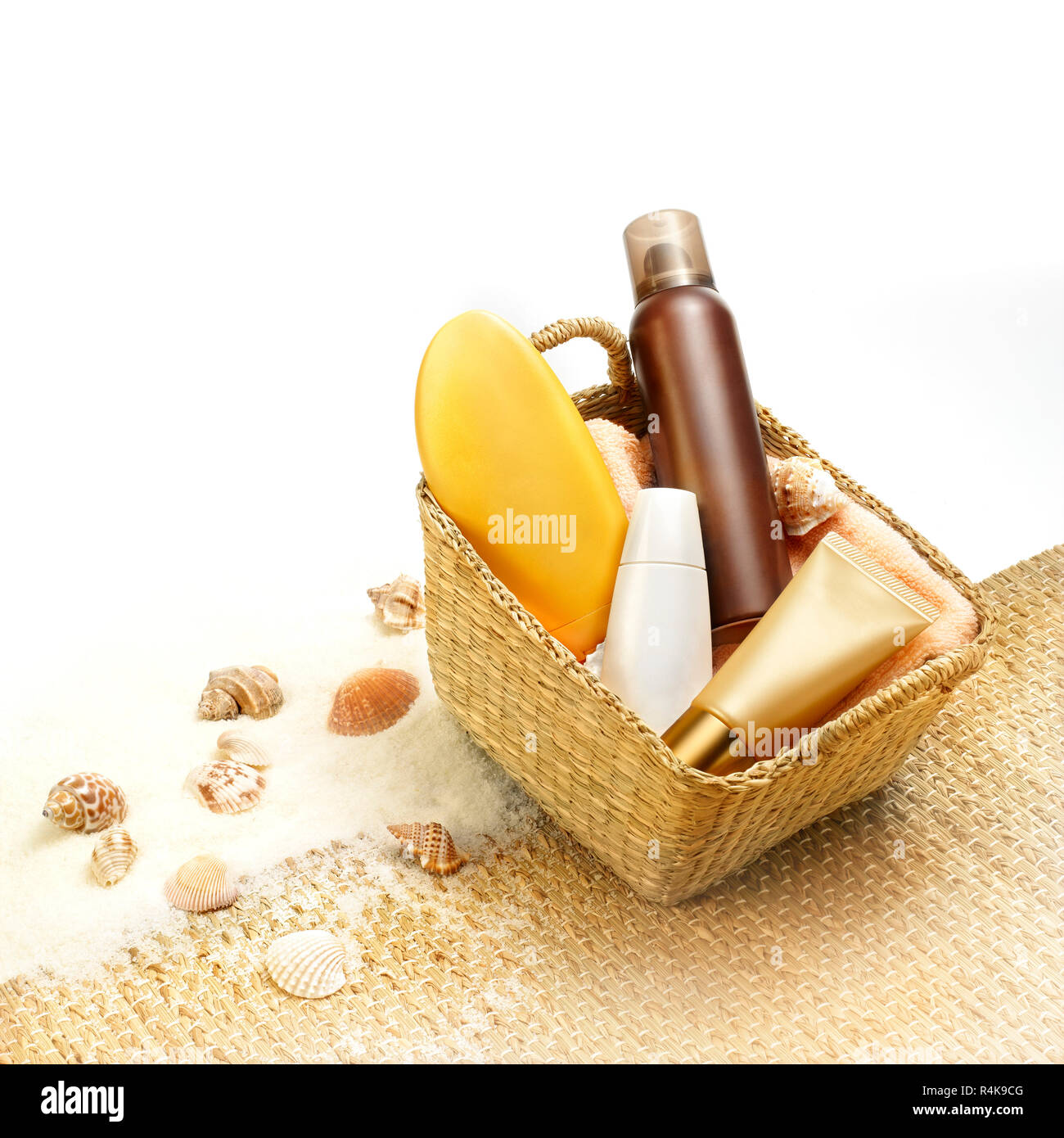 Studio shot of suntan cosmetics against beach environment Stock Photo