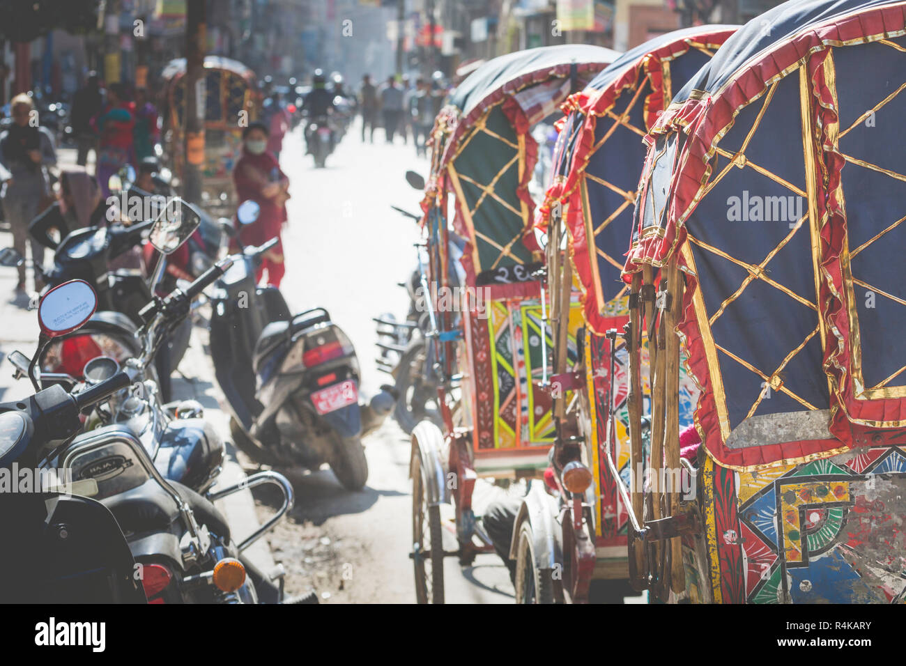 Wheeled rickshaws waiting for customers in Kathmandu Stock Photo - Alamy