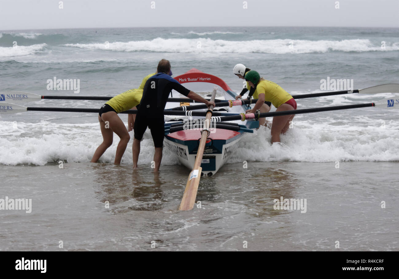 Surf Boats in action with Surf  life saver crews Towan Beach, Cornwall, UK. Stock Photo