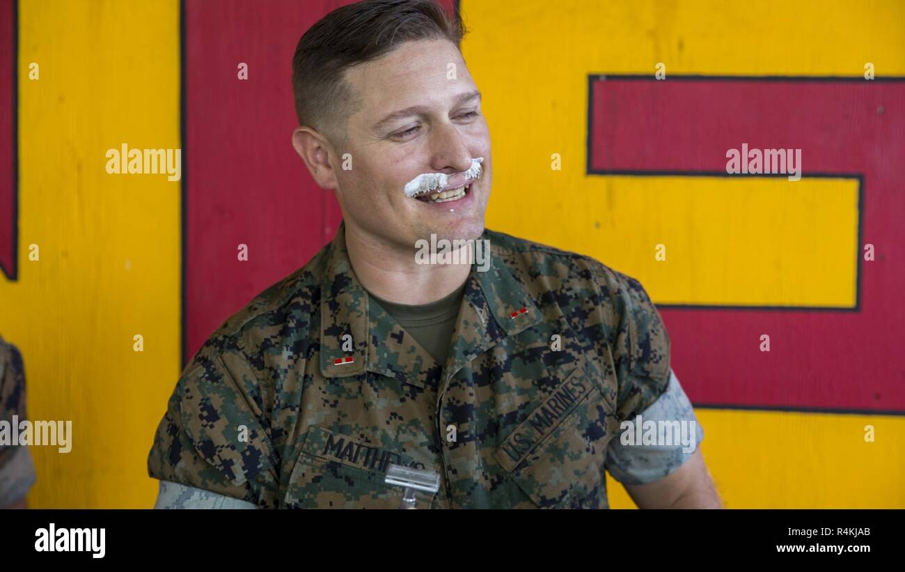 A U.S. Marine with 3rd Marine Regiment, 3rd Marine Division shaves off their mustache to begin