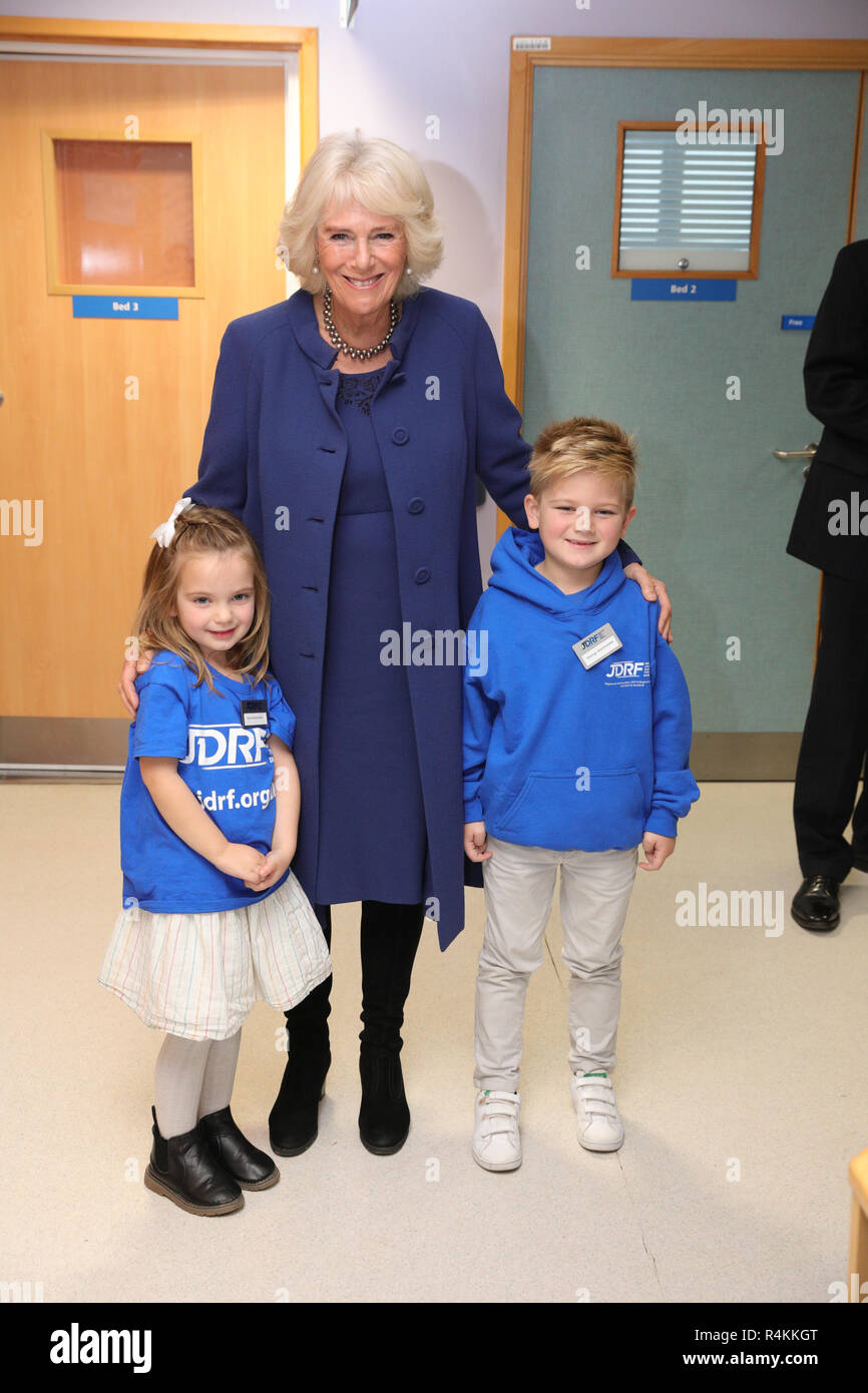 The Duchess of Cornwall meets George Vinnicombe, who suffers from Type 1 diabetes, and his sister Ava Vinnicombe during a visit to Addenbrooke's Hospital, Cambridge. Stock Photo