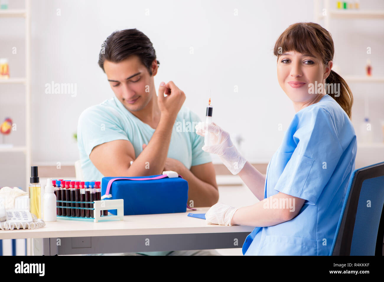 Young patient during blood test sampling procedure Stock Photo - Alamy