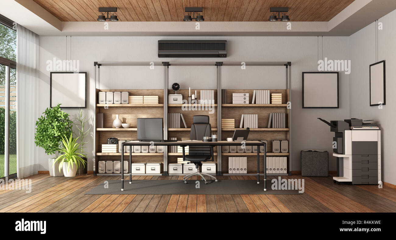 Modern office with bookcase , desk with laptop and photocopier - 3d rendering Stock Photo