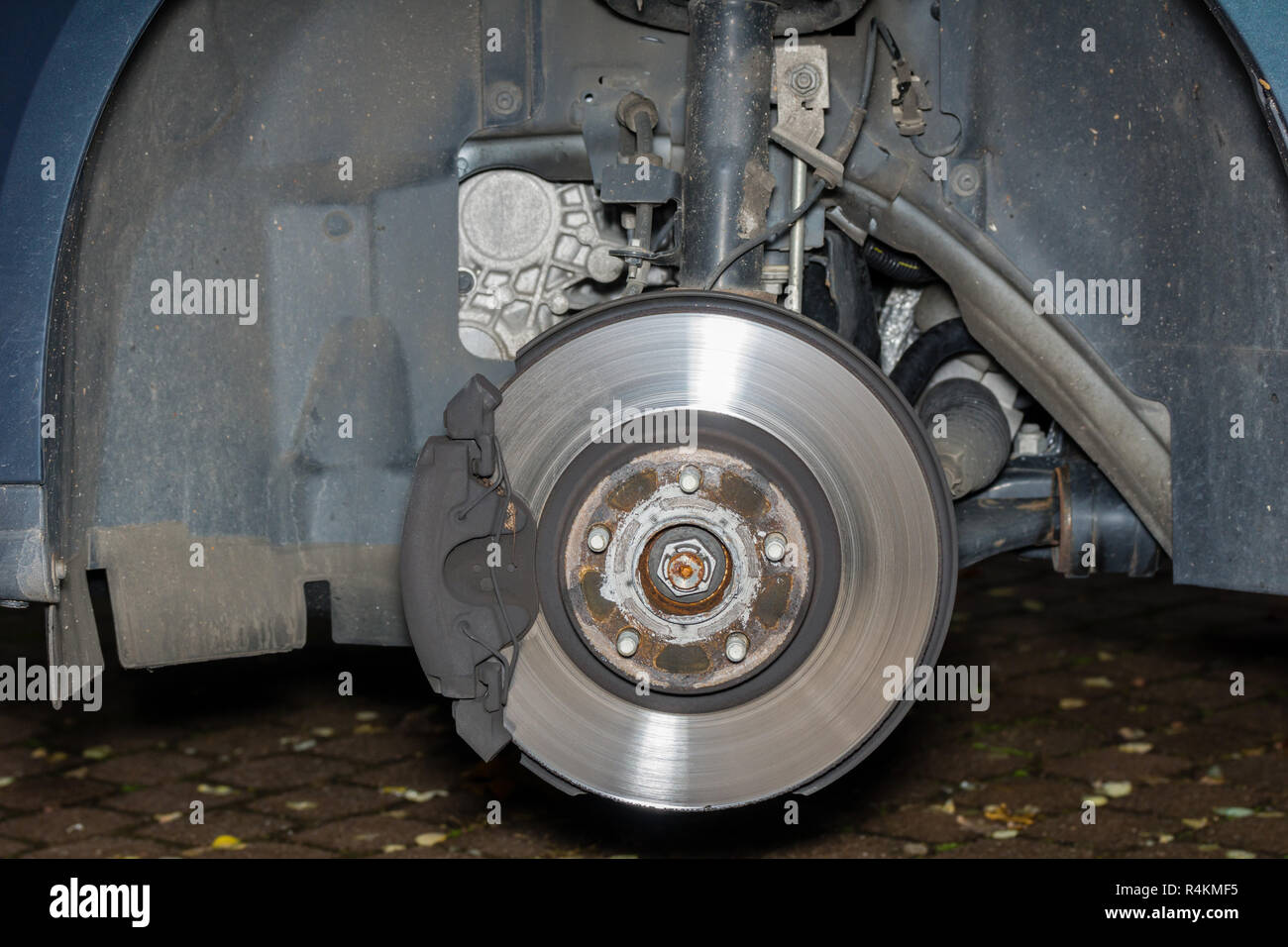 when changing tires exposed suspension Stock Photo Alamy