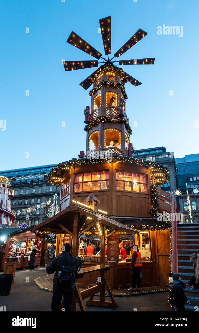 Large windmill with nativity figures and a Christmas Market stall