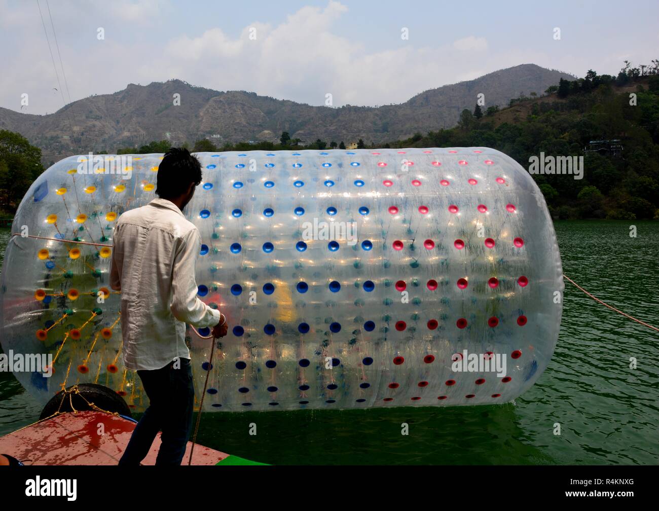 The water ball or water balloon ( Zorbing ) and boats of the Sattal adventure sports in Nanital. Stock Photo