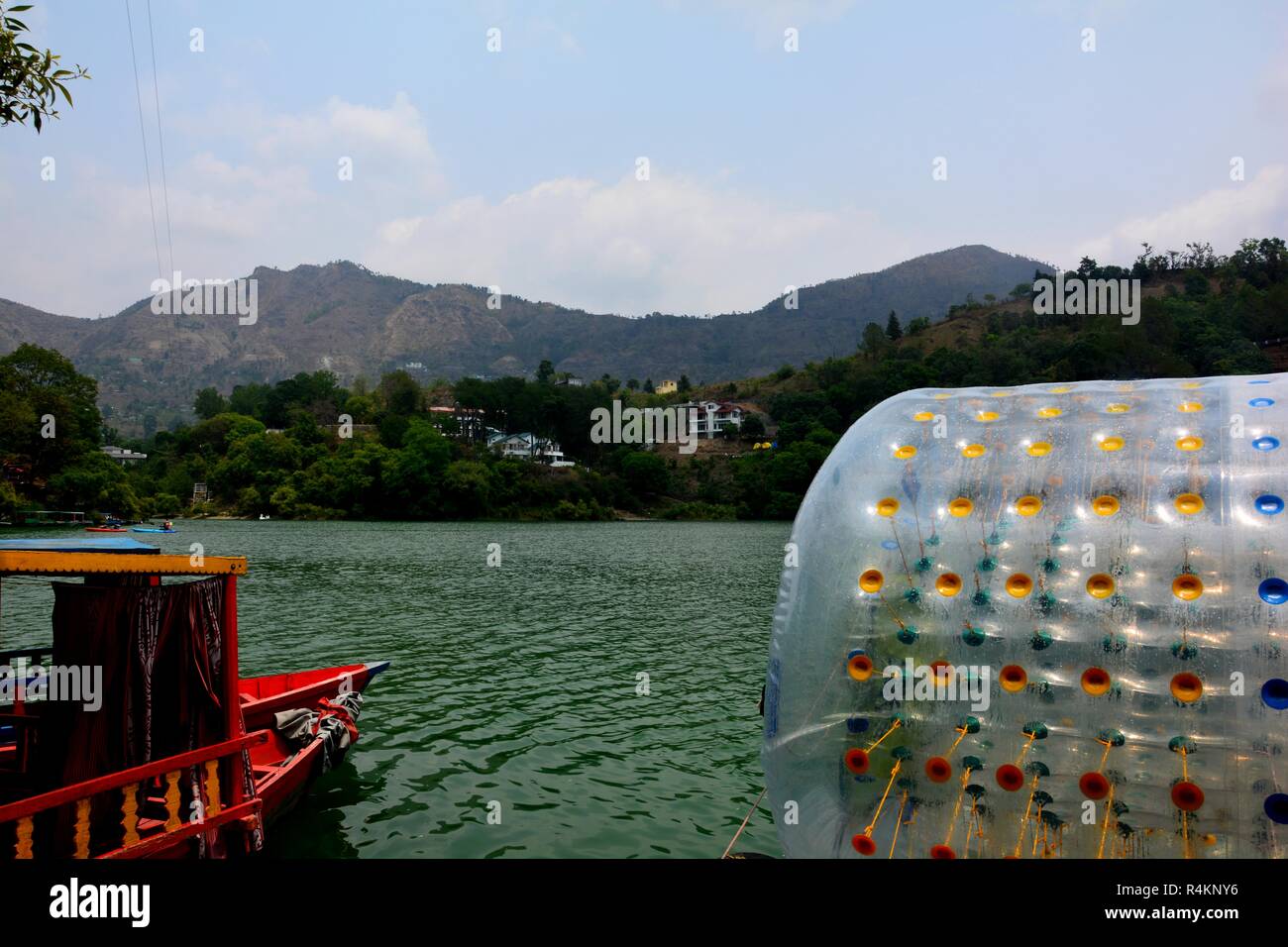 The water ball or water balloon ( Zorbing ) and boats of the Sattal adventure sports in Nanital. Stock Photo