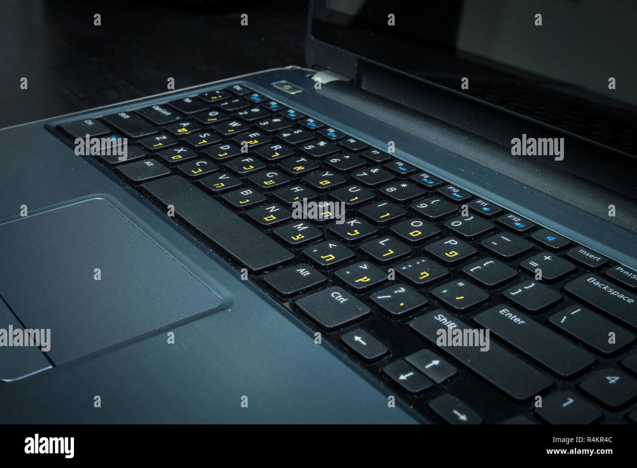 Keyboard with letters in Hebrew and English Stock Photo