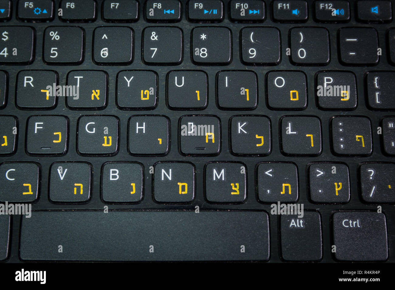 Keyboard with letters in Hebrew and English Stock Photo Alamy