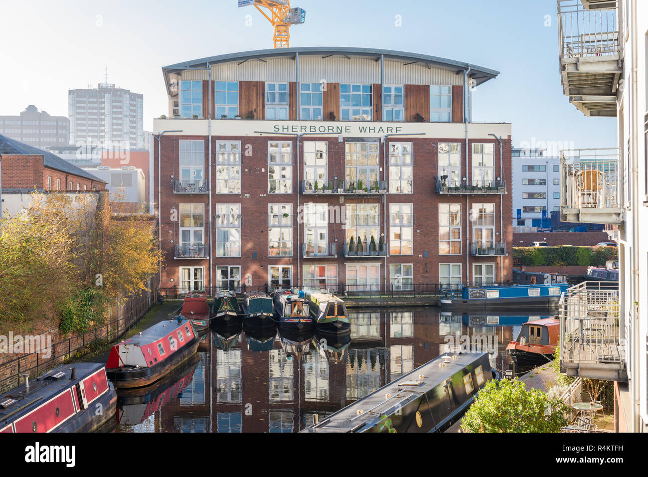 Waterside apartments overlooking the Birmingham Canal Old Line in Birmingham City Centre Stock Photo
