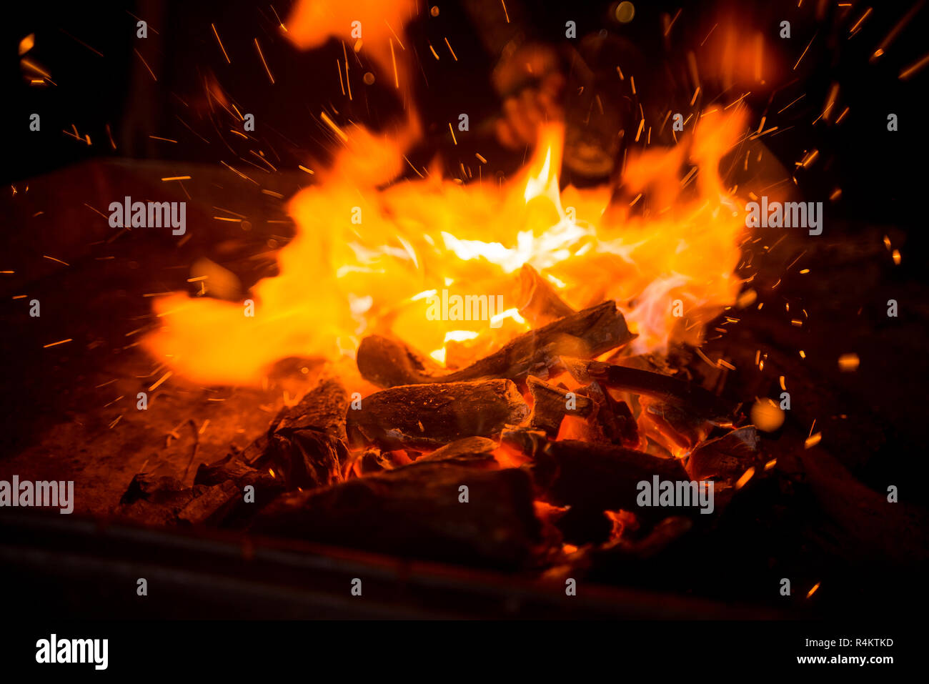 live burning coals with fire and sparks Stock Photo Alamy