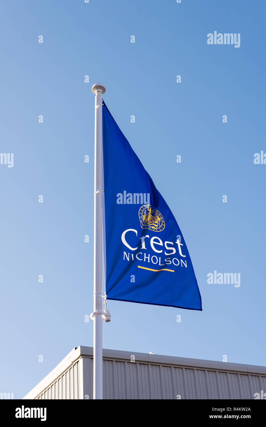 Crest Nicholson House Builders Blue Flag Flying On Construction
