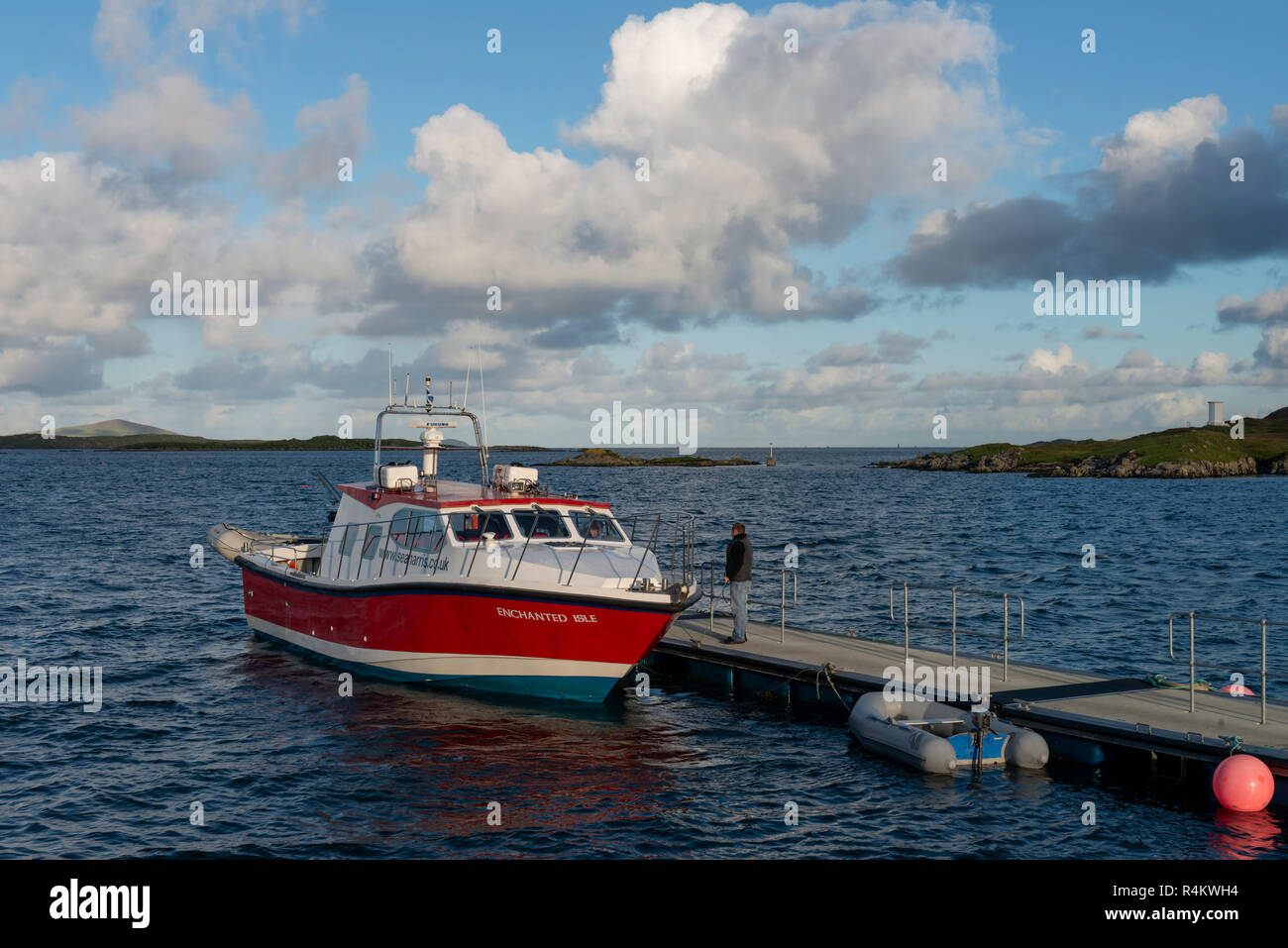 A power boat taking trips to St. Kilda from Leverburgh on the Isle of Harris Stock Photo