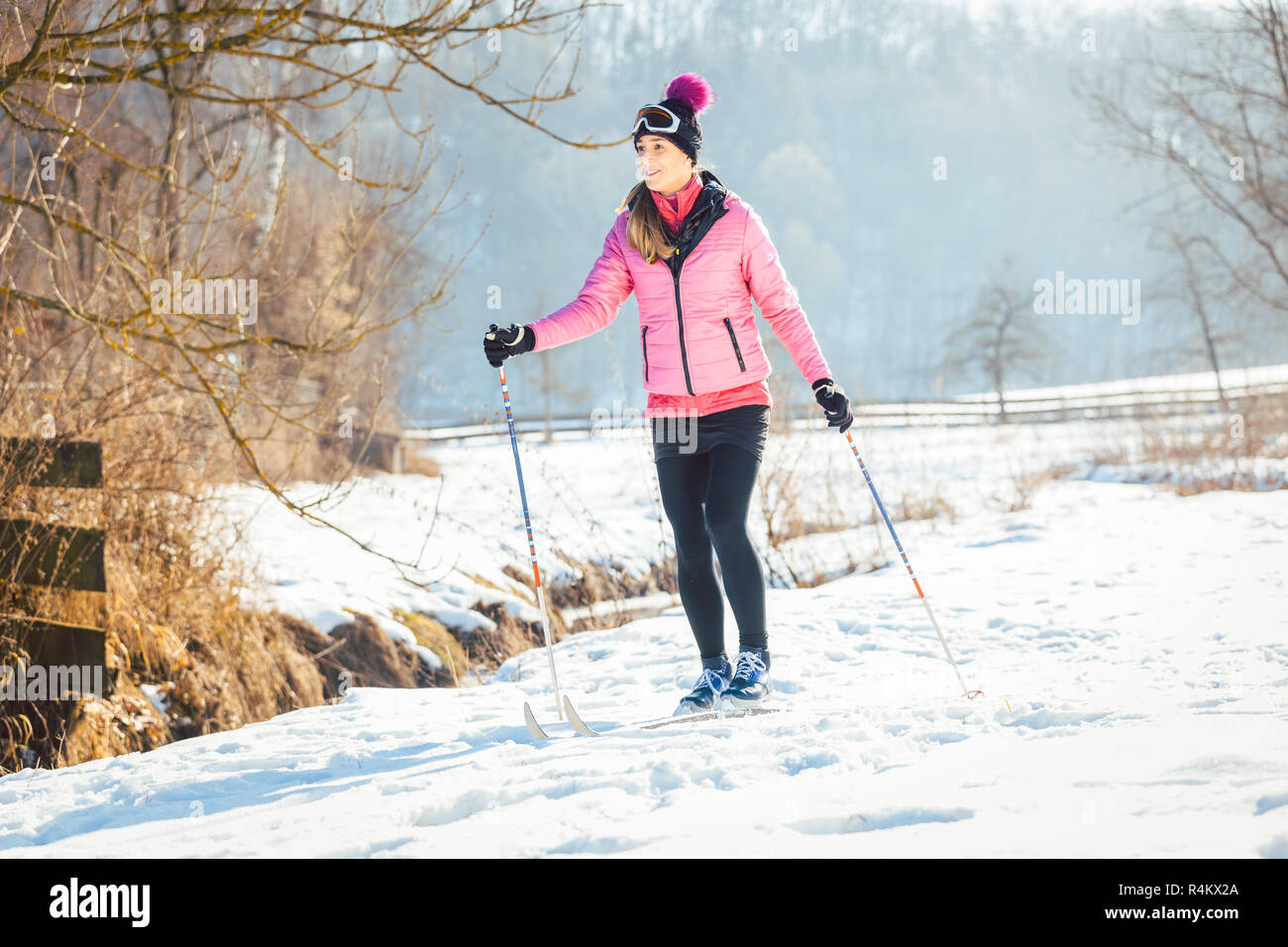 Woman doing cross country skiing as winter sport Stock Photo