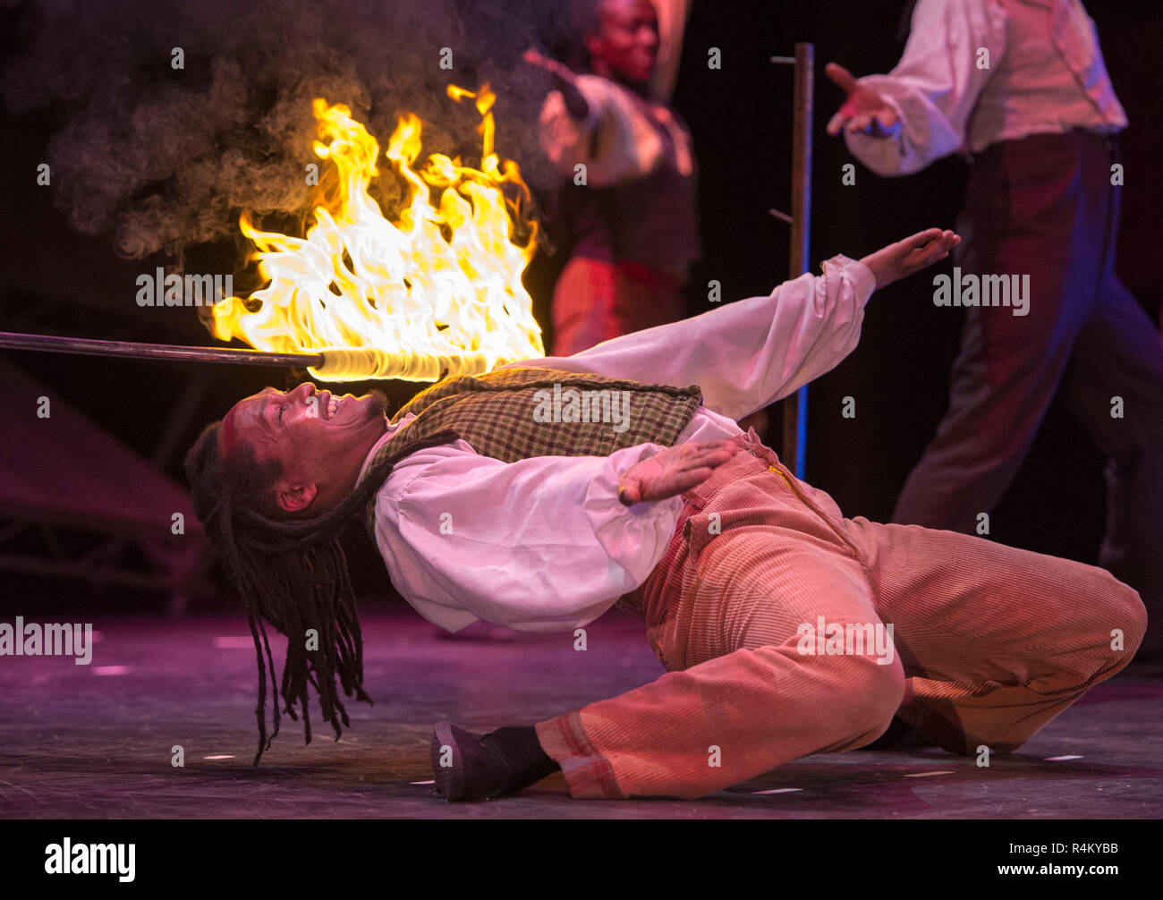 Limbo dancer performs during part of the Berserk stage show at the Festival Theatre in Edinburgh. Stock Photo