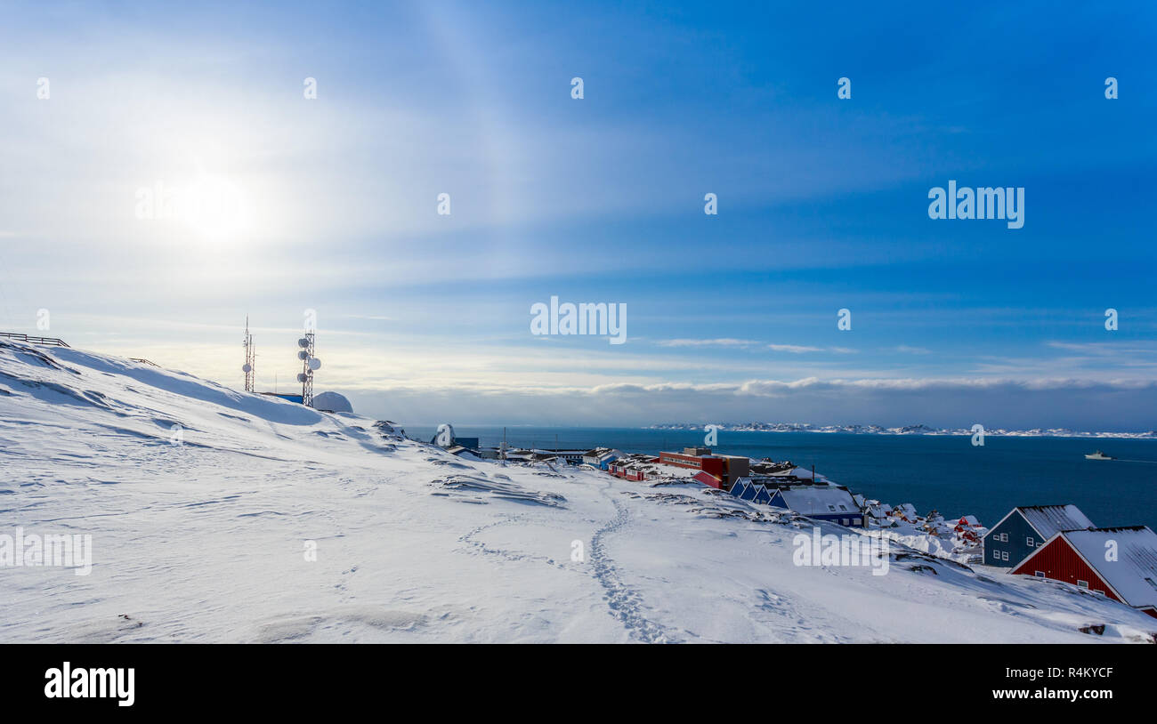 Arctic Sun Halo shining over houses at the fjord of Nuuk city, Greenland Stock Photo Alamy