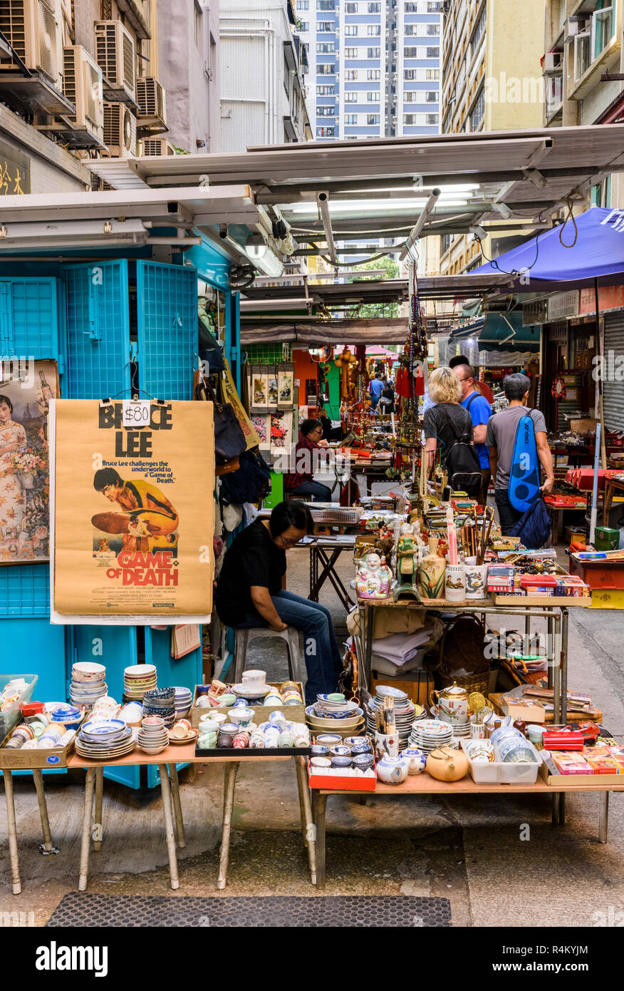 Tourists shopping along Upper Lascar Row, commonly known as Cat St in Hong Kong Stock Photo