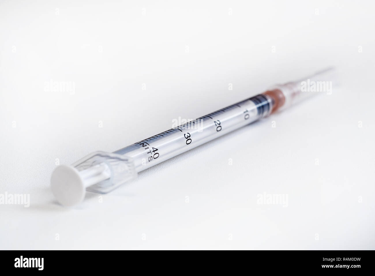 Disposable syringe. Plastic insulin syringe. The insulin syringe with