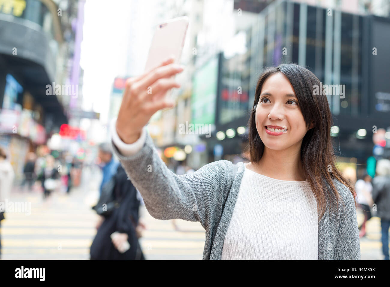 Woman travel in Hong Kong and taking selfie Stock Photo - Alamy
