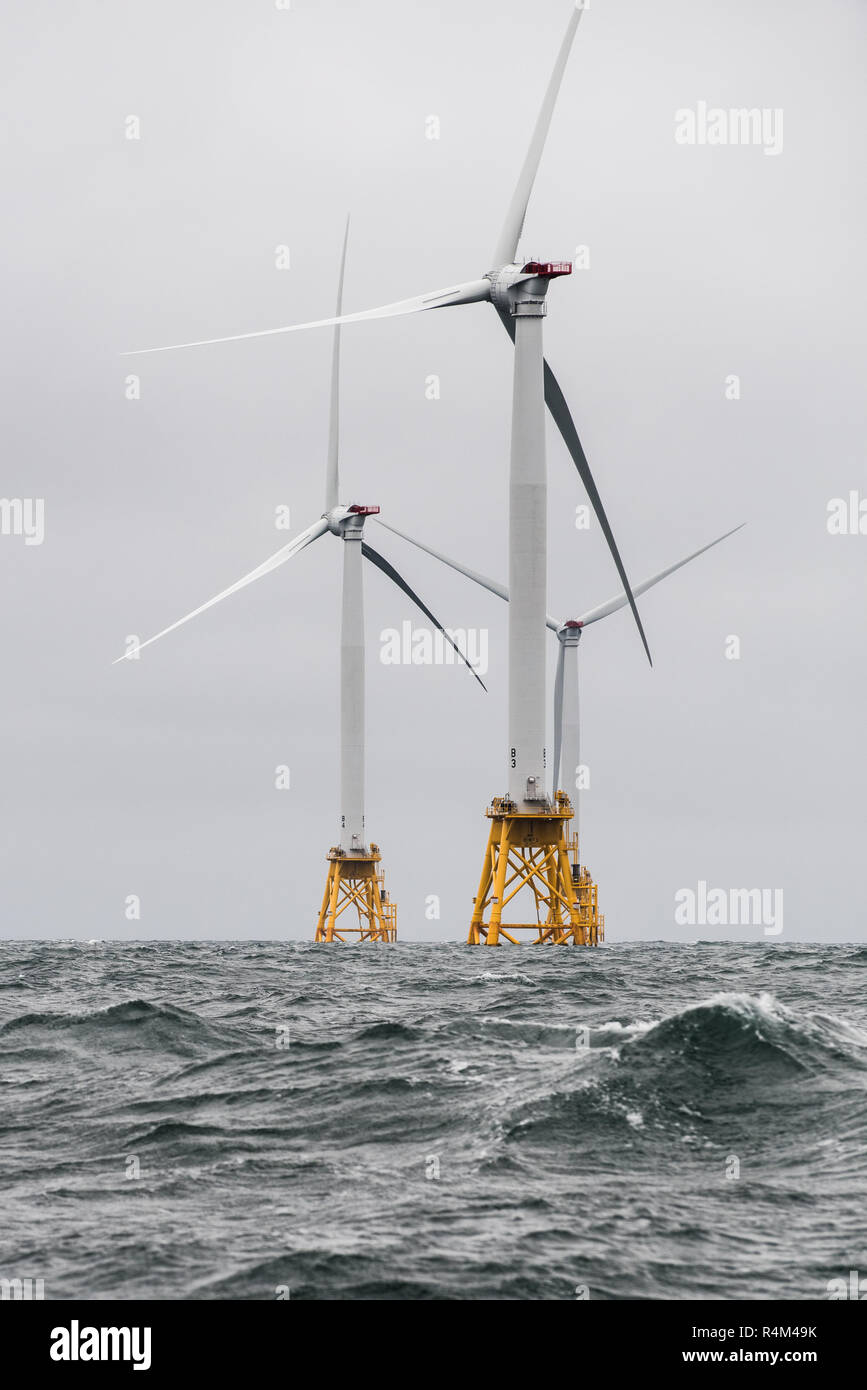 October 1, 2016 - The Block Island Wind Farm off the coast of Rhode Island is the first US offshore wind farm. Five Halide 6MW turbines, recently installed by Deepwater Wind, are being commissioned for use. (Photo by Dennis Schroeder / NREL) Stock Photo