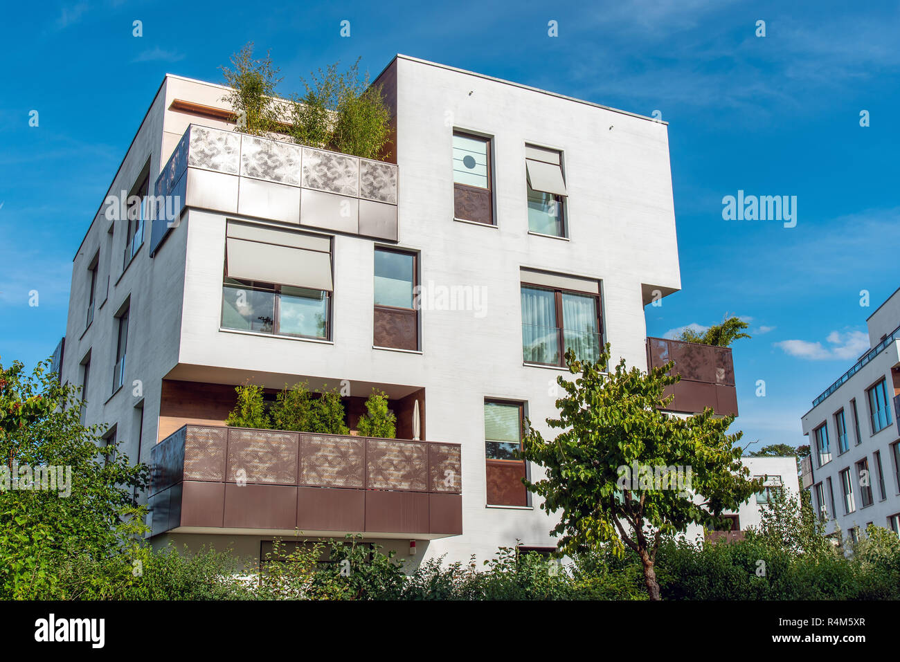 Modern white apartment house with metal balconies seen in Berlin ...