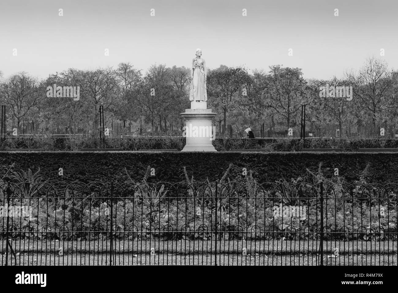 under rain , walking through the streets of Paris , Luxembourg gardens Stock Photo