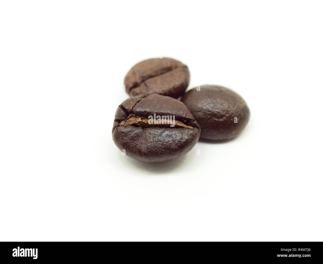 Fresh Coffee beans isolated on white background Stock Photo - Alamy