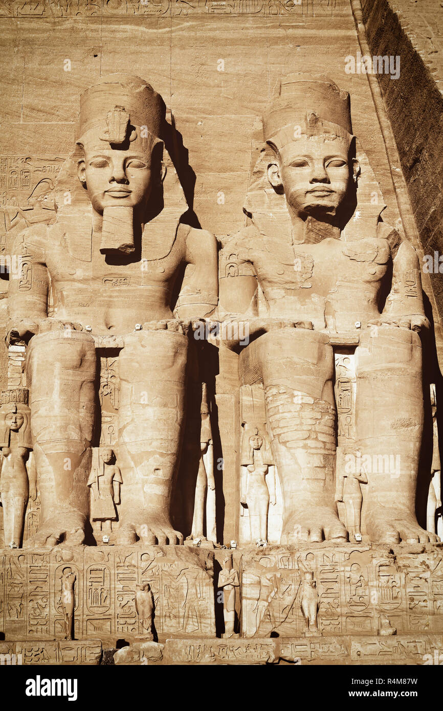 Statues of the Ramesses II and Nefertari in Abu Simbel temple Stock