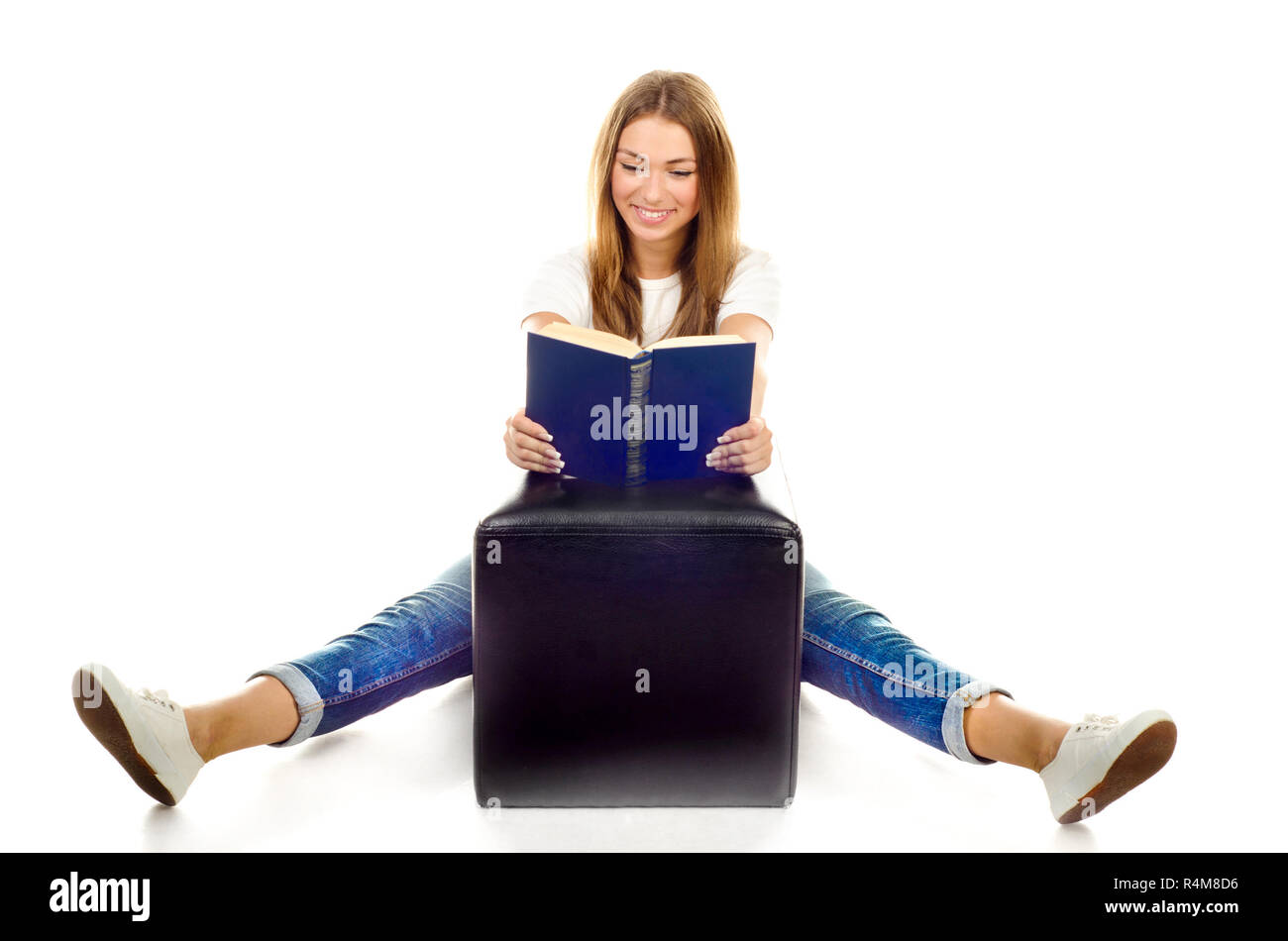 young girl reading book isolated on a white background Stock Photo - Alamy