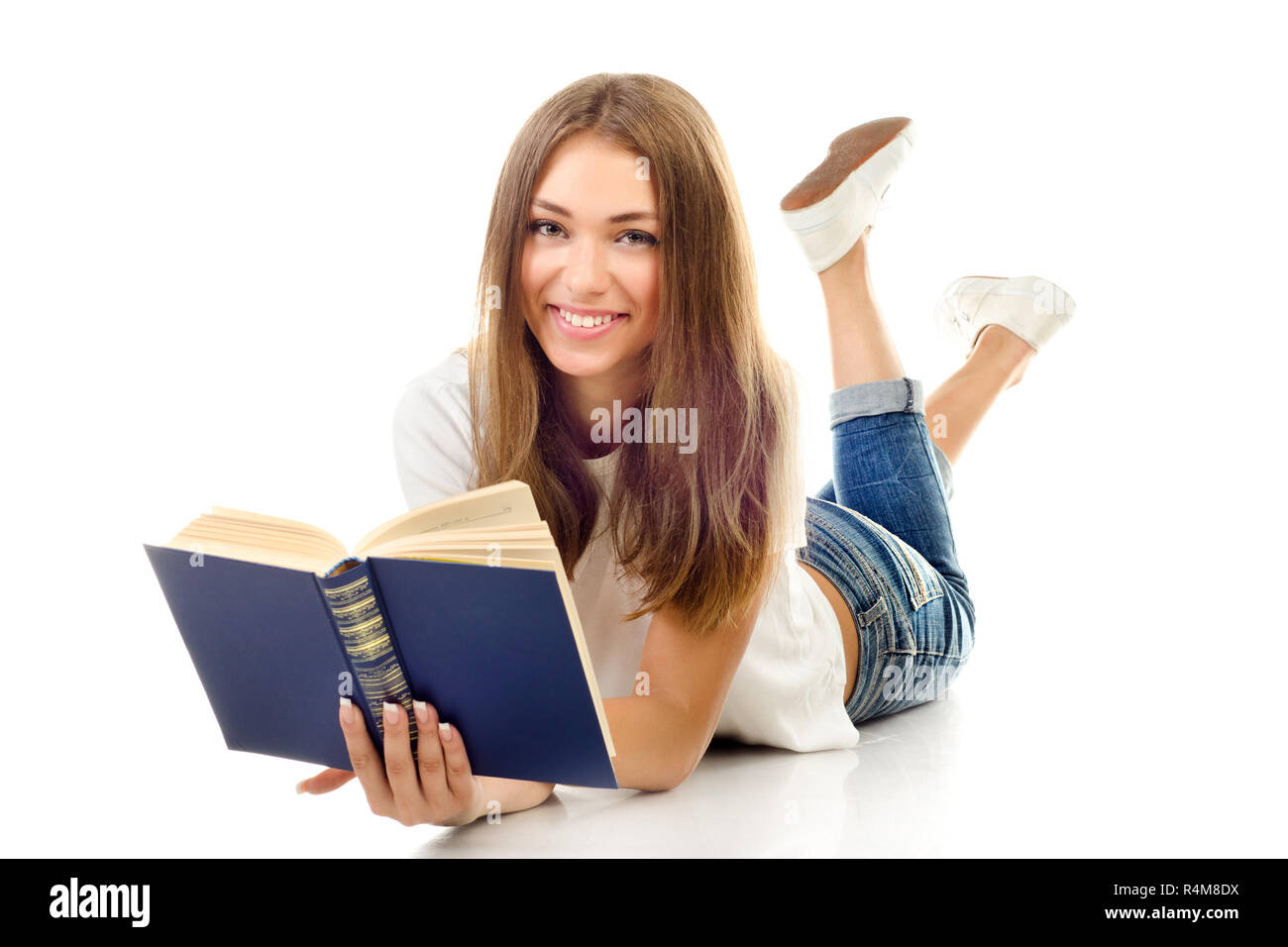young girl with book isolated on a white background Stock Photo - Alamy