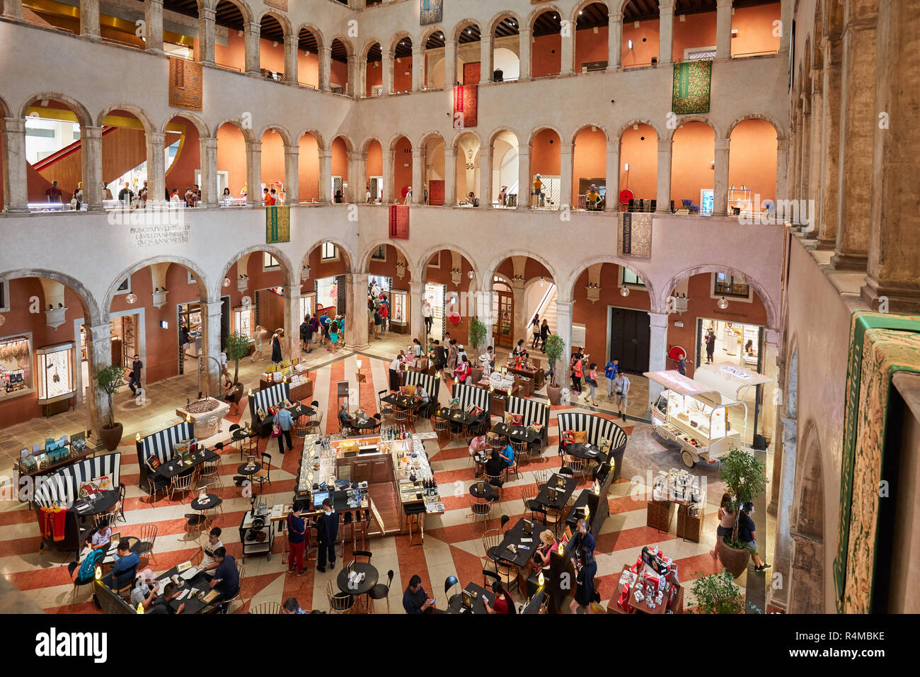 VENICE, ITALY - AUGUST 15, 2017: Fondaco dei Tedeschi, luxury department store interior with people and tourists Stock Photo