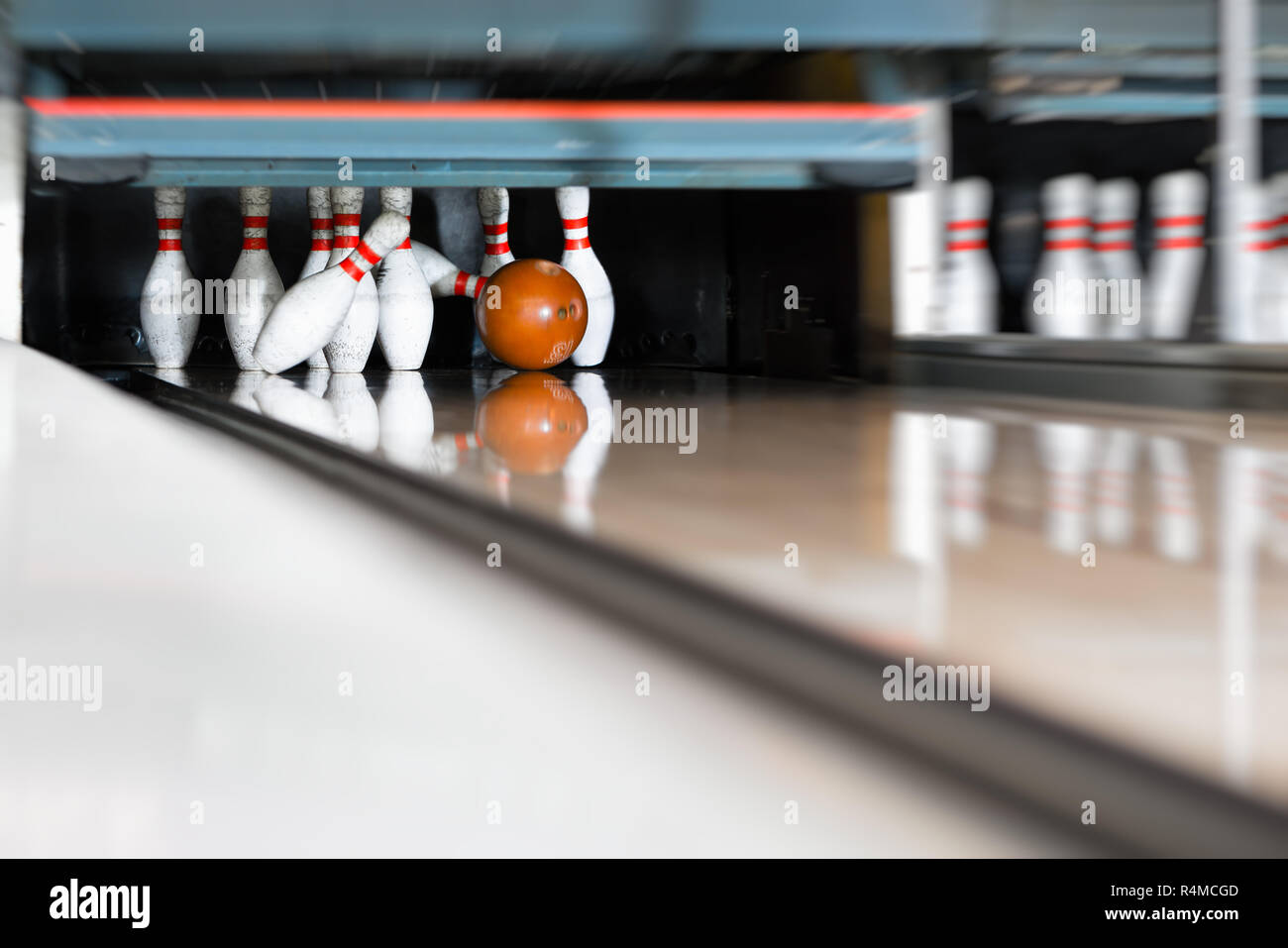 Bowling ball encounters the pin Stock Photo